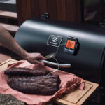 BBQ Bluetooth Thermometer probe inserted into beef